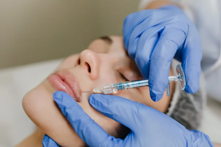 Gloved provider administering Botox in Kirkland, WA to a patient at Divine Naturopathic Clinic.